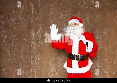 Santa Claus mit der Tasche des präsentiert Stockfoto