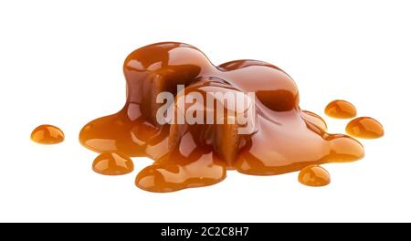 Caramel Bonbons und Karamellsauce auf weißem Hintergrund Stockfoto