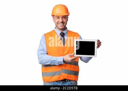 Bauarbeiter Halten Tablet Mit Leerem Bildschirm, Studio-Aufnahme, Mockup Stockfoto