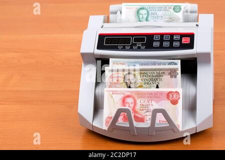 Luxemburgischer Franc in einem zählmaschine Stockfoto