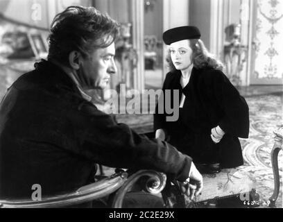 CLAUDE RAINS und BETTE DAVIS in DECEPTION 1946 Regie IRVING RAPPER Musik Erich Wolfgang Korngold Warner Bros. Stockfoto