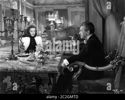 BETTE DAVIS und CLAUDE RAINS in DECEPTION 1946 Regie IRVING RAPPER Musik Erich Wolfgang Korngold Warner Bros. Stockfoto