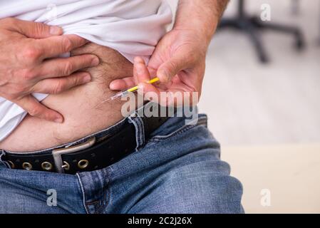 Patient leidet an Diabetes Hausarzt Stockfoto