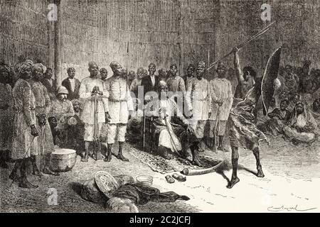 Maour-Ugongu schwört, Namionju und sein Land zu schlucken. Zentralafrika. Reise in das unerforschte Afrika, den geheimnisvollen Kontinent von Henry Morton Stanley. Alte Illustration aus dem 19. Jahrhundert, El Mundo Ilustrado 1880 Stockfoto