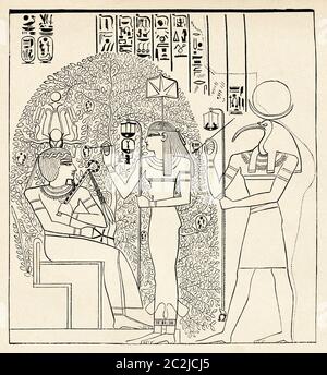 Atmoo, Thoth und die Göttin der Buchstaben Seshat, die den Namen Remeses auf der Frucht des Persees schreibt. Memnonium, Theben, Altes Ägypten. Alte Illustration aus dem 19. Jahrhundert, El Mundo Ilustrado 1880 Stockfoto