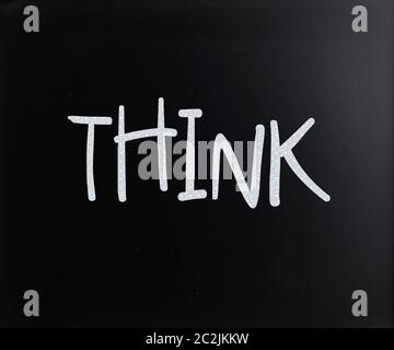 Das Wort "glaube" mit weißer Kreide auf einer Tafel handschriftliche Stockfoto