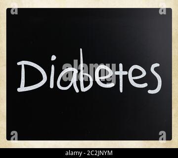 Das Wort "Diabetes" handschriftlich mit weißer Kreide auf einer Tafel Stockfoto