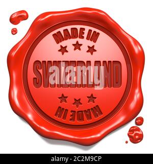 Made in Swizerland - Stempel auf Red Wax Seal isoliert auf Weiß. Geschäftskonzept. 3D-Rendern. Stockfoto