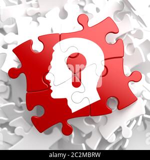 Psychologisches Konzept - Profil des Kopfes mit einem Schlüsselloch auf Red Puzzle. Stockfoto