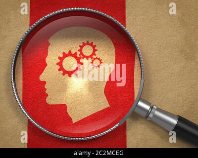 Lupe mit Symbol des Kopfprofils mit Zahnrad Zahnradmechanismus auf altem Papier mit rotem Hintergrund der vertikalen Linie. Stockfoto