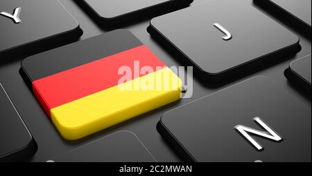 Flagge Deutschlands - Taste auf der schwarzen Computertastatur. Stockfoto