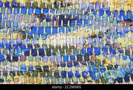 Struktur aus einem gestrickten Stoff. Ein Foto aus nächster Nähe. Stockfoto