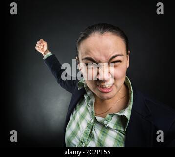 Wütend Geschäftsfrau wird Sie schlagen Stockfoto
