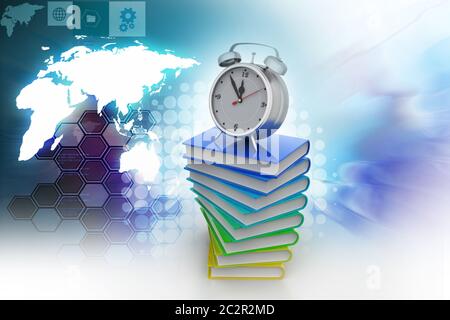 Wecker auf Bücher Stockfoto