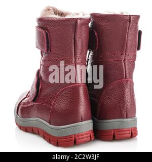 Rote Kinder Winterstiefel für Mädchen auf weißem Hintergrund. Foto für Schuhe Werbung Stockfoto