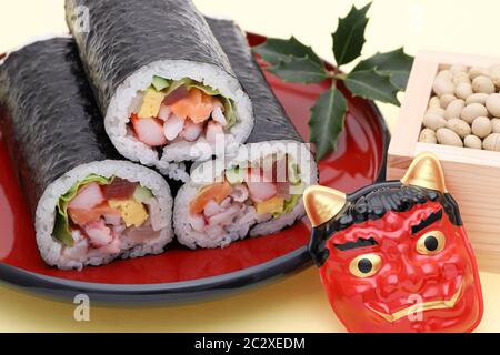 Bei einer jährlichen Veranstaltung werden traditionelle japanische Setsubun Events, Masken von Oni Daemon und Homaki verwendet Stockfoto