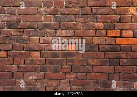 In der Nähe von Old Red Brick Wall Stockfoto