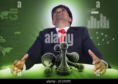 Business Mann mit schwarzer Bauer auf Farbe isoliert Stockfoto