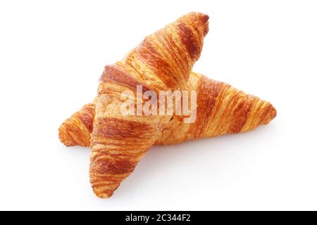 Zwei Butter Croissants isoliert auf weißem Stockfoto