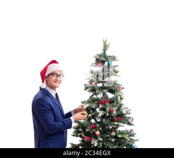 Geschäftsmann schmücken Weihnachtsbaum isoliert auf weißem Stockfoto