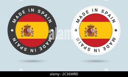 Set mit zwei spanischen Stickern. Hergestellt in Spanien. Einfache Symbole mit Flags. Stock Vektor