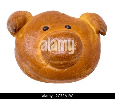 Weihnachtsplätzchen in Form eines Schweins als Glücksplätzchen / Schmalzkekse isoliert auf Weiß Stockfoto