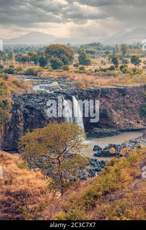 Blue Nile fällt in der Trockenzeit mit einem dramatischen Himmel von Even. Äthiopische Wildnis, Amhara-Region, in der Nähe von Bahir dar und Tana-See Stockfoto