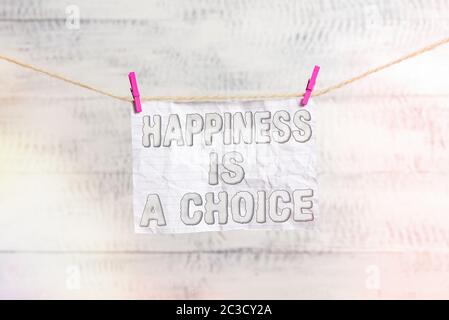 Handschrift Text Schreiben Glück ist EINE Wahl. Konzeptionelle Foto glücklich bleiben, egal was inspiriert motiviert Wäscheleine Wäscheklammer Rechteck geformt Stockfoto