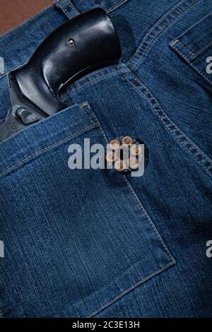 Gun Und Denim Stockfoto