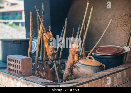 Guineapig geröstet - traditionelle Mahlzeit in Peru. Südamerika Stockfoto