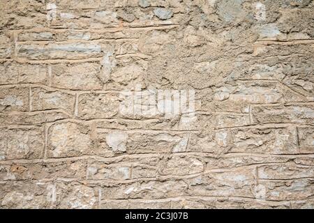Vintage weiß beige Farbe Stein Wand Hintergrund und Textur, Gebäude Fassade Wand Grunge Material Stockfoto