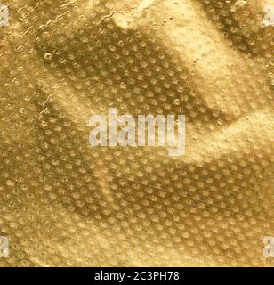 goldene Textur von zerknittert Folienblatt, Vollrahmen, Element für Designer Stockfoto