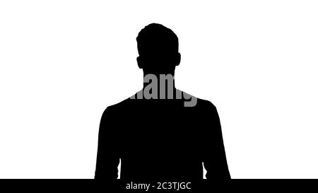 Silhouette Blinder in Gesichtsmaske und in dunklen Gläsern mit Gehen. Stockfoto