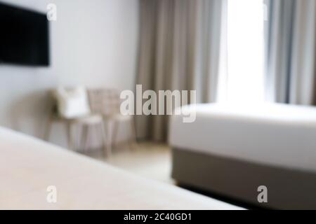 Verschwommener Hintergrund eines Schlafzimmers in einem Hotel Stockfoto