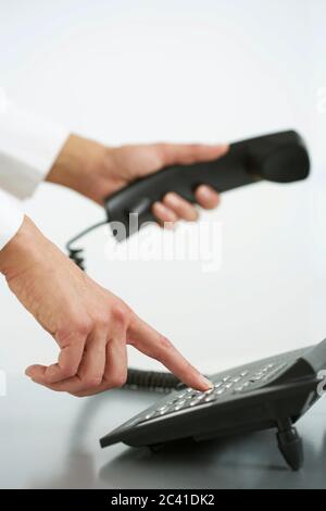 Drücken Sie eine Taste auf einem Telefon Stockfoto