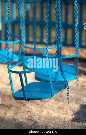 Blaue Karussellsitze Stockfoto