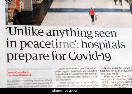 "Im Gegensatz zu allem, was in Friedenszeiten gesehen wird": Krankenhäuser bereiten sich auf Covid-19 vor" Artikel der Guardian Zeitung 13 March 2020 London England Großbritannien Stockfoto