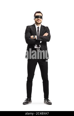 In voller Länge Porträt eines Mannes in einem schwarzen Anzug trägt eine Augenbinde isoliert auf weißem Hintergrund Stockfoto