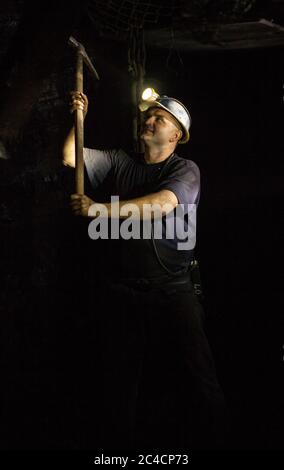 Porträts von Bergleuten in einer Braunkohlemine Stockfoto