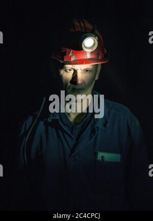 Porträts von Bergleuten in einer Braunkohlemine Stockfoto