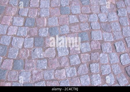 Hintergrund Straßenfertiger, Stein, alte Pflaster, getönte Bild Stockfoto