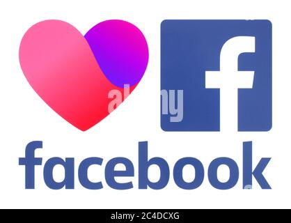 Kiew, Ukraine - 29. Oktober 2019: Neues Facebook Dating App Icon und alte Facebook Logos, gedruckt auf Papier. Facebook ist ein bekanntes soziales Netzwerk Stockfoto