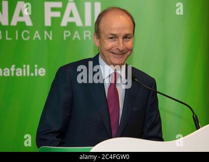 Fianna Fail-Anführer Micheal Martin, der die Rolle des irischen Premierministers bei der historischen Versöhnung einer politischen Fehde mit Fine Gael übernehmen wird, die bis zur Staatsgründung vor einem Jahrhundert zurückreicht, spricht im Clayton Hotel in Dublin: Nach vier Monaten politischer Blockade wurde gebrochen, nachdem Mitglieder von Fianna scheitern, Fine Gael und die Grünen stimmten für das Programm für die Regierung zu verabschieden. Stockfoto