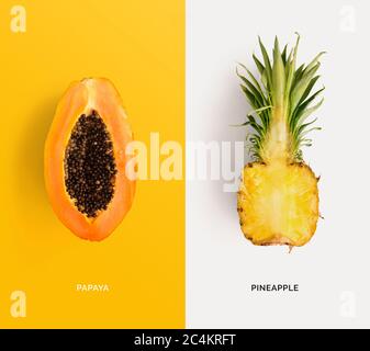 Kreatives Layout aus Papaya und Ananas. Flach liegend. Lebensmittelkonzept. Stockfoto