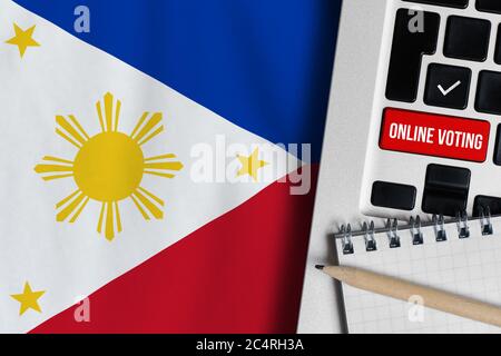 Online-Voting-Konzept in der Republik Philippinen. Tastatur in der Nähe der Länderflagge. Stockfoto