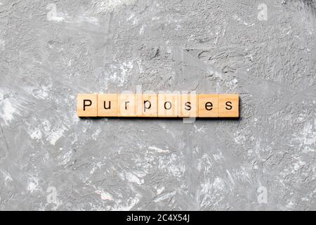 Zweck Wort auf Holzblock geschrieben. Zweck Text auf Tisch, Konzept. Stockfoto