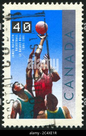 KANADA - UM 1991: Briefmarke gedruckt von Kanada, zeigt Basketball, um 1991 Stockfoto