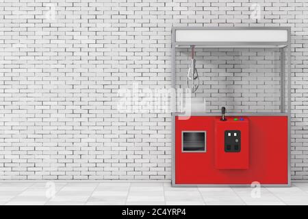 Leere Karneval Rote Spielzeug Kralle Kran Arcade-Maschine vor der Ziegelwand. 3d-Rendering. Stockfoto
