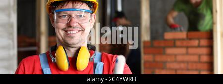 Vorarbeiter zeigt ok Geste, arbeiten Baumeister Job Stockfoto