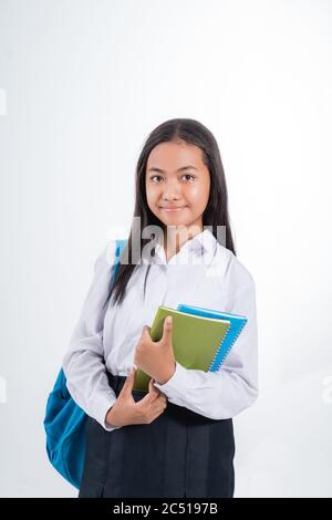Schöne indonesische Junior High School Student Porträt trägt blau und weiß Uniform Stockfoto